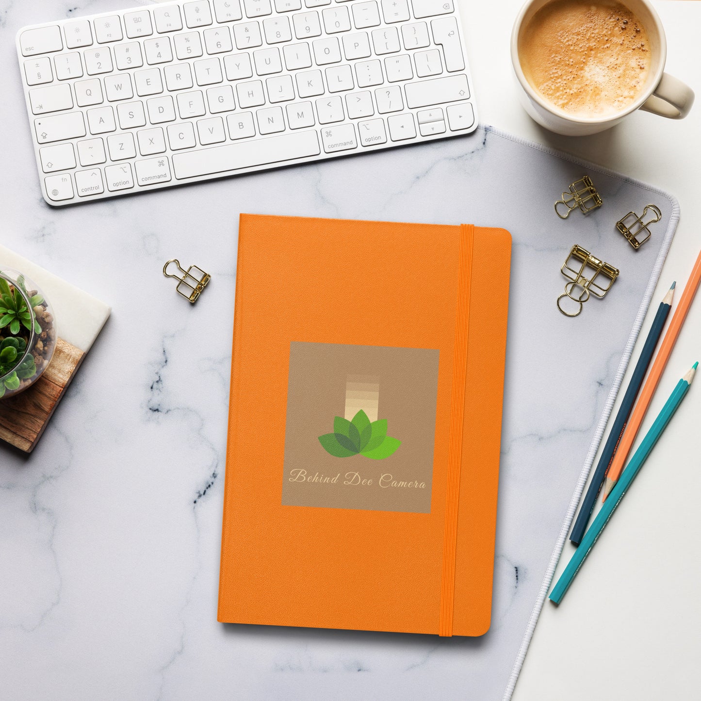Hardcover bound notebook - Behind Dee Camera® logo (background)