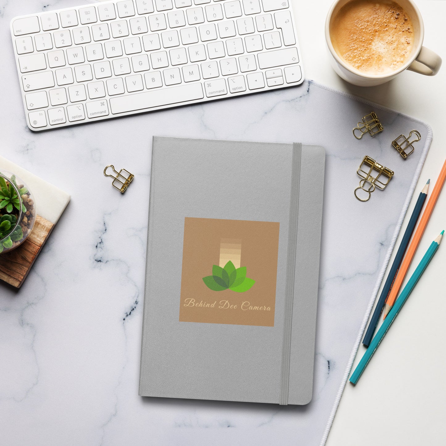 Hardcover bound notebook - Behind Dee Camera® logo (background)