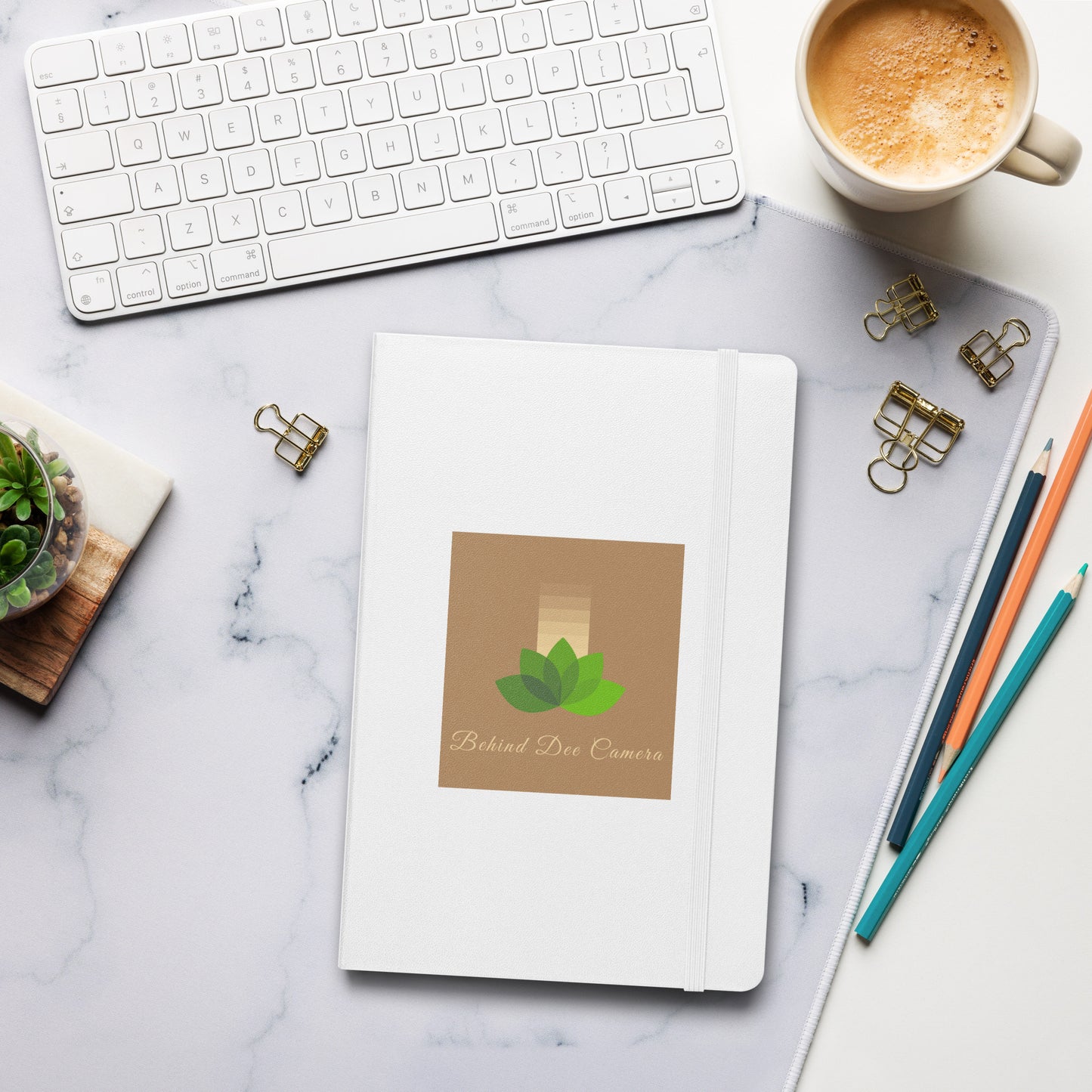 Hardcover bound notebook - Behind Dee Camera® logo (background)