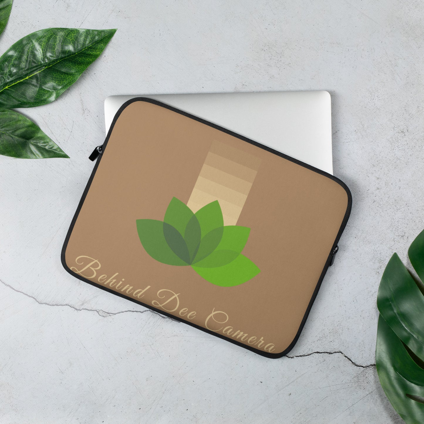 Laptop Sleeve - Behind Dee Camera® logo (background)