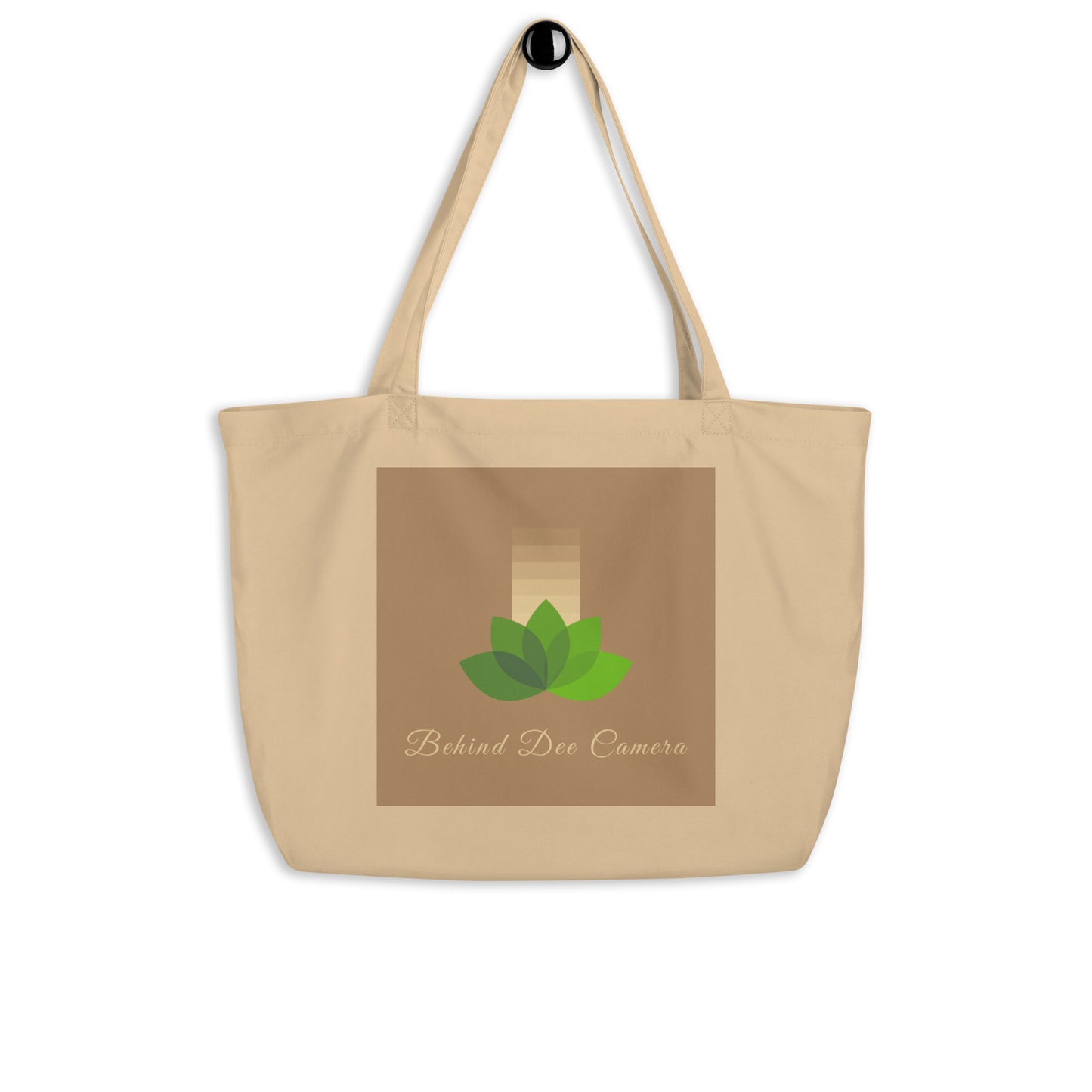 Large organic tote bag - Behind Dee Camera® logo (background)